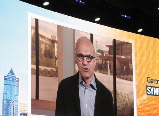 Microsoft CEO Satya Nadella speaks over satellite to an audience at the Gartner Symposium/ITXpo on Tuesday.