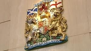 HMRC Coat of Arms on wall.png