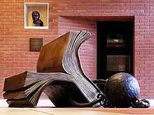 Bill Woodrow - Sitting on History - British Library Sculpture.jpg