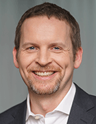 Dr. Christian Tölkes, Accenture