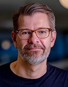 Headshot of Alwin Bakkenes.