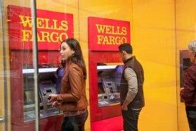 Picture of Wells Fargo customers using the ATMs