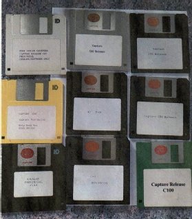 Image of multiple floppy disks containing Post Office Capture software releases