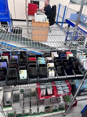 Picture of used mobile phones ready for recycling at O2 Recycle in Norwich.