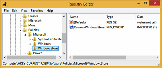 Change the registry to disallow downloads from the Windows Store.
