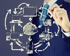 man drawing circle of various electronic devices