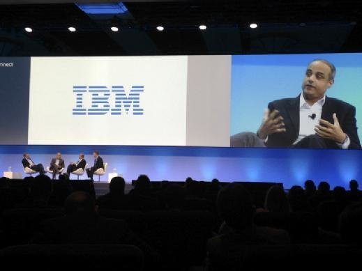 Takhliq Hanif, chief architect at Etihad Airways, (on screen) speaks on a panel on transforming business models with digital technology.