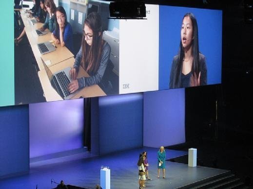 Onstage at IBM InterConnect, Michelle Liang speaks about her experience in a Girls Who Code tech workshop.