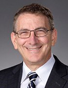 A headshot of Mark Schuster, founding dean and CEO of the Kaiser Permanente School of Medicine. 