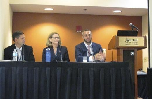 Jascha Franklin-Hodge, CIO at Boston's city government, speaks during a panel discussion at the SIM Boston Technology Leadership Summit on Thursday. Also on the panel are Deborah Corwin Scott, CIO at Worcester Polytechnic Institute and Peter Moreau, senior vice president and CIO at Amica.