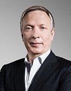headshot image of Ratmir Timashev, co-founder of Veeam