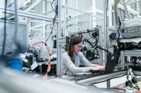An electronics engineer runs vehicle tests.