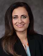 Headshot of Bettina Deynes, global chief human resources officer for Carnival Corp.