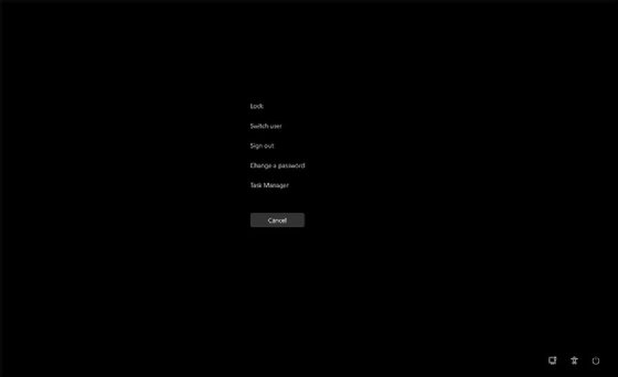 A black screen with a list of menu options in the center and icons in the bottom right corner.
